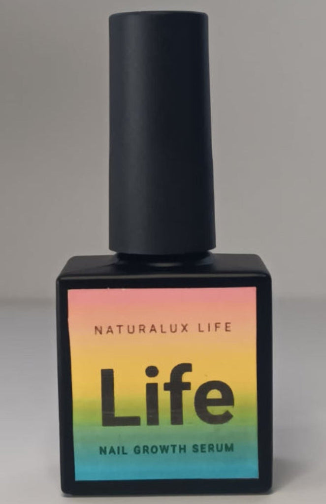 Nail growth serum bottle with gradient label on a gray background