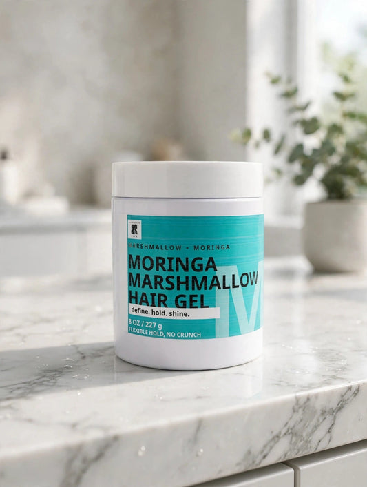 Moringa Marshmallow Hair Gel jar on a bright bathroom vanity